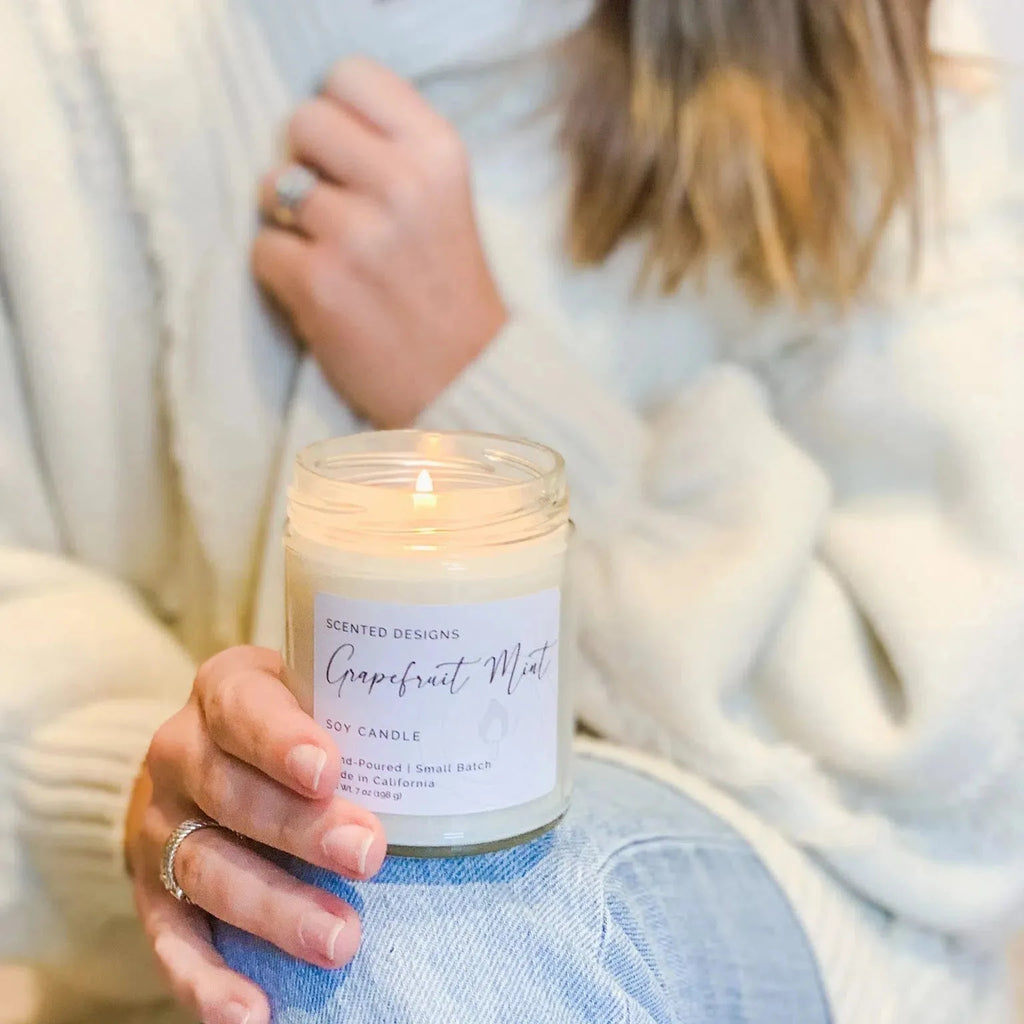 woman with grapefruit candle